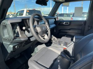 Image of the interior and steering wheel of the 2025 Ford Bronco